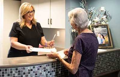 patient receiving her new patient information